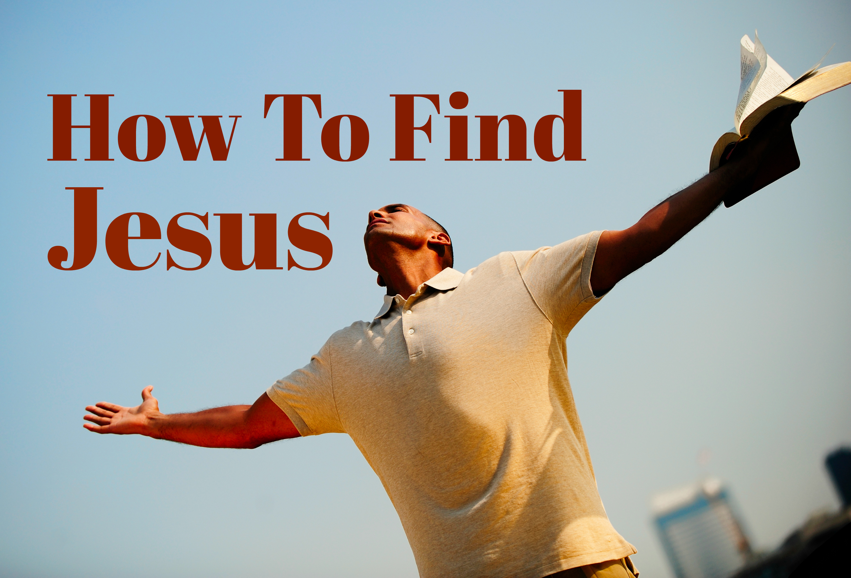 man holding bible / outdoors and with outstretched arms / praying heavenward
